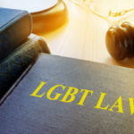 Book with title LGBT Law and gavel