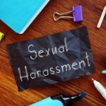 Sexual Harassment is shown on the conceptual business photo