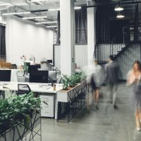 modern open space office interior with blurred business colleagues